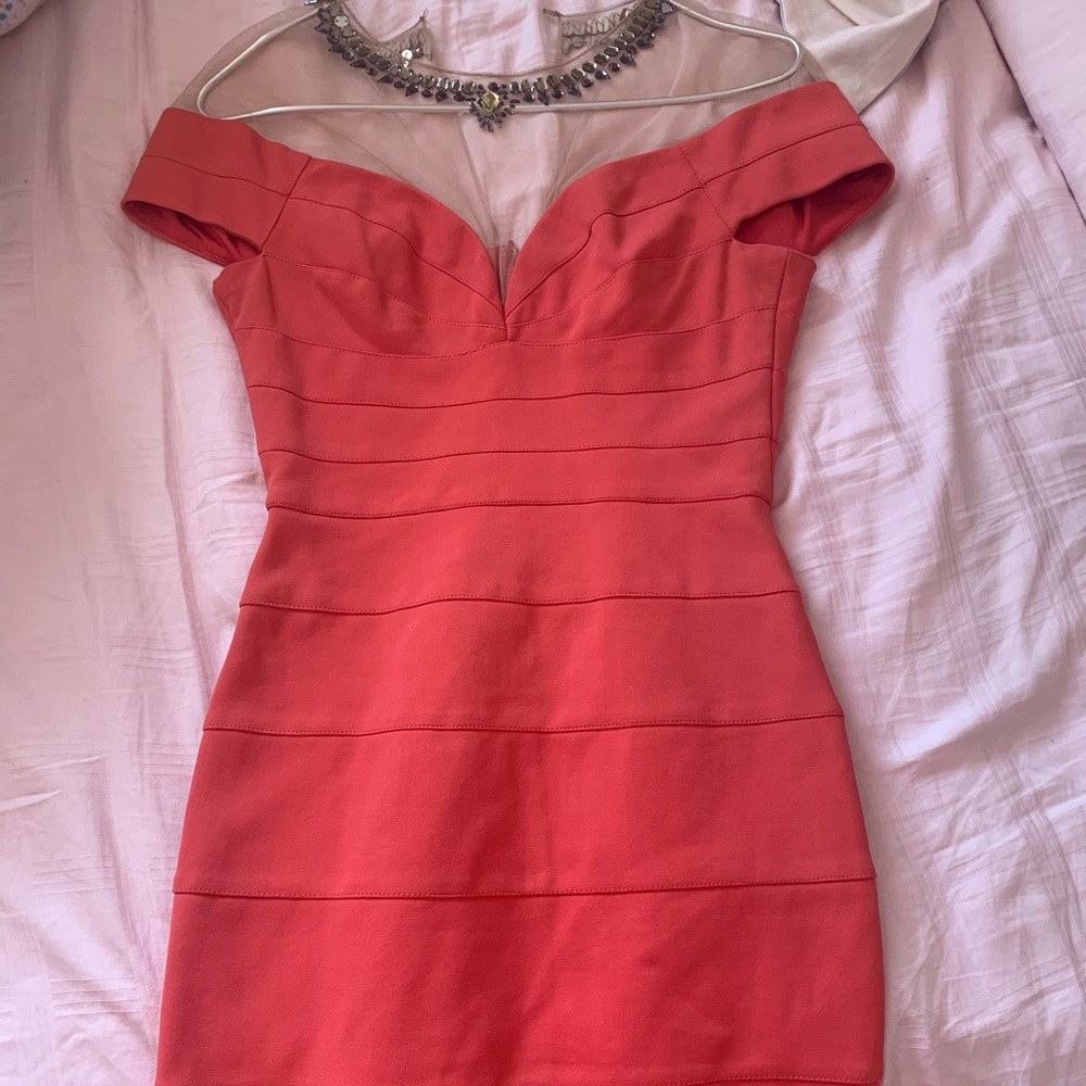 Bodycon dress with a fishnets shoulder and jewels